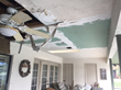 Structural deterioration caused by severe storm damage that led to uninhabitable conditions