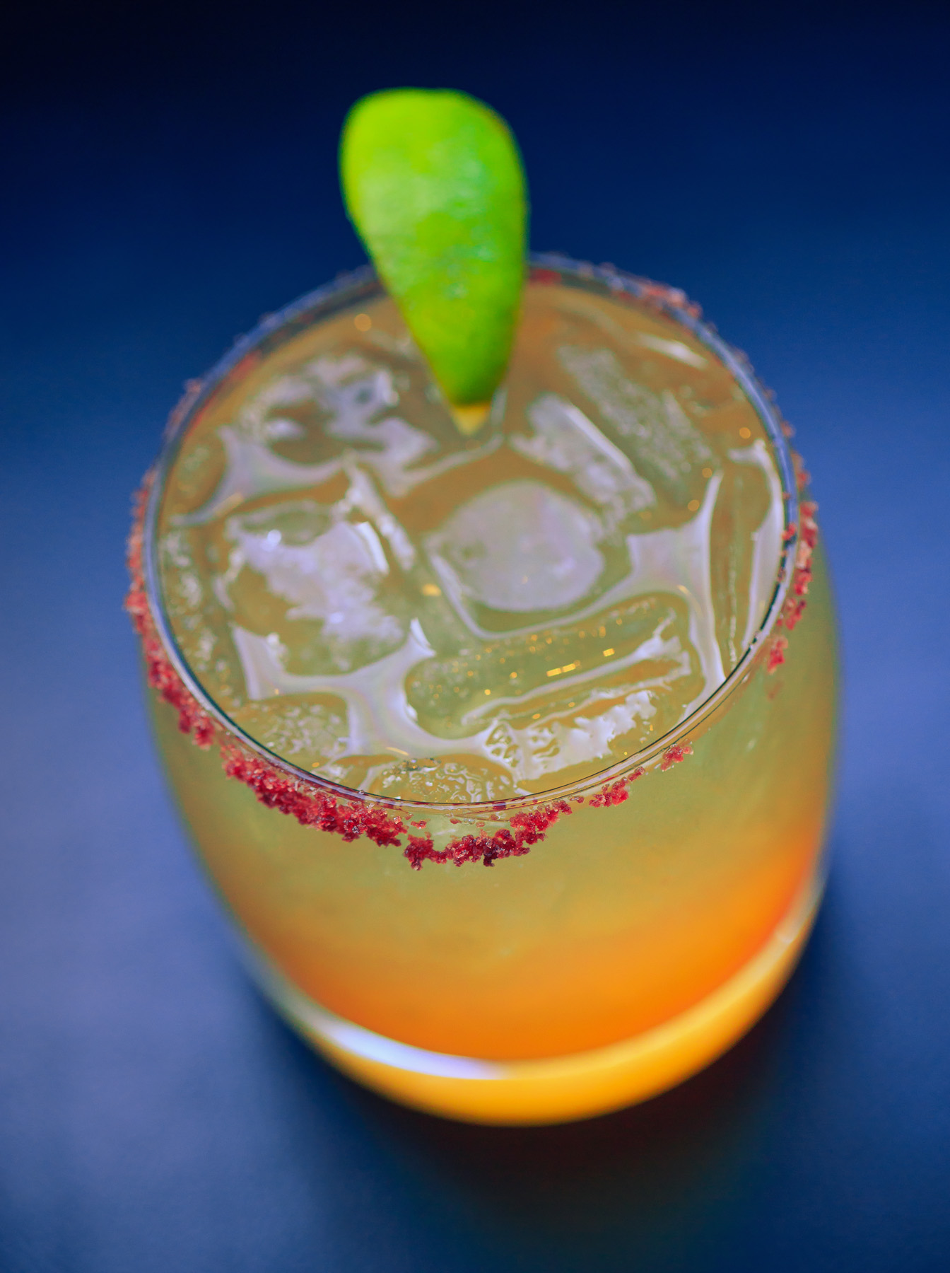 The "Bottlest Margarita", part of Bottlest's new cocktail mixology program, features Sauza Blue Reposado Tequila, orange liqueur, and a house-made Pinot Noir salt rim.