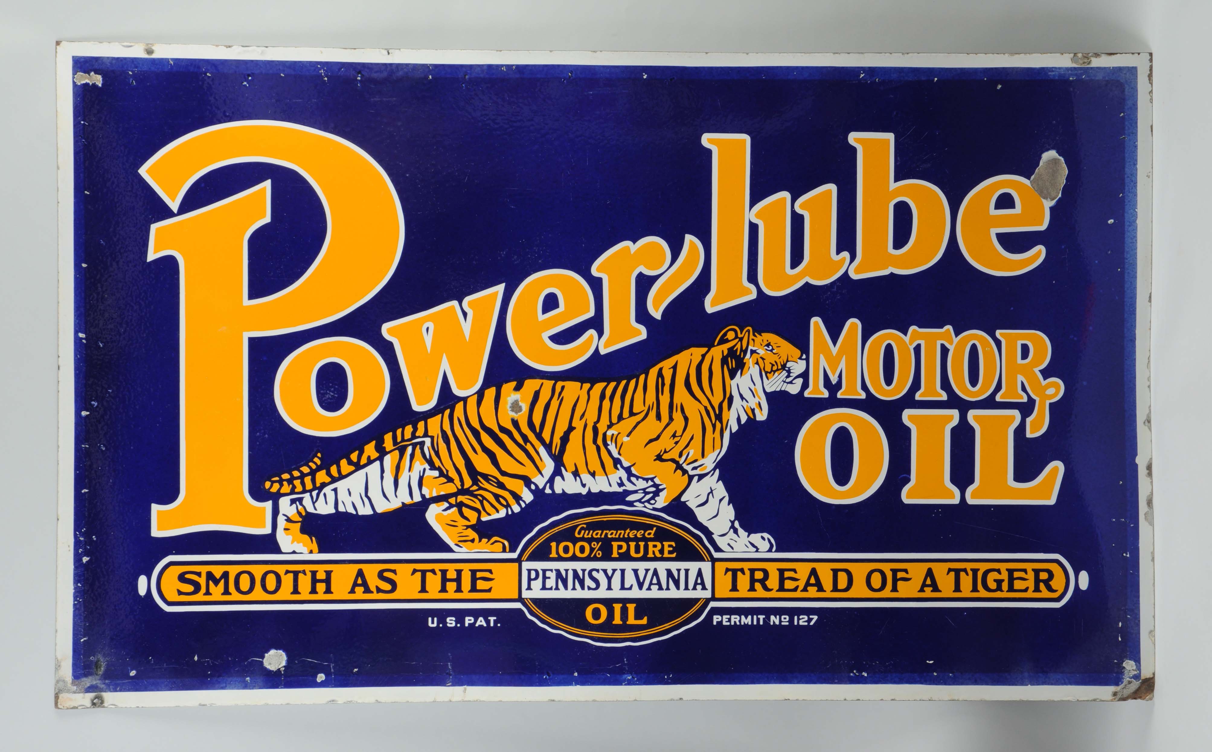 Lot #137,  Power-Lube Motor Oil Sign, estimated at $10,000-$20,000.