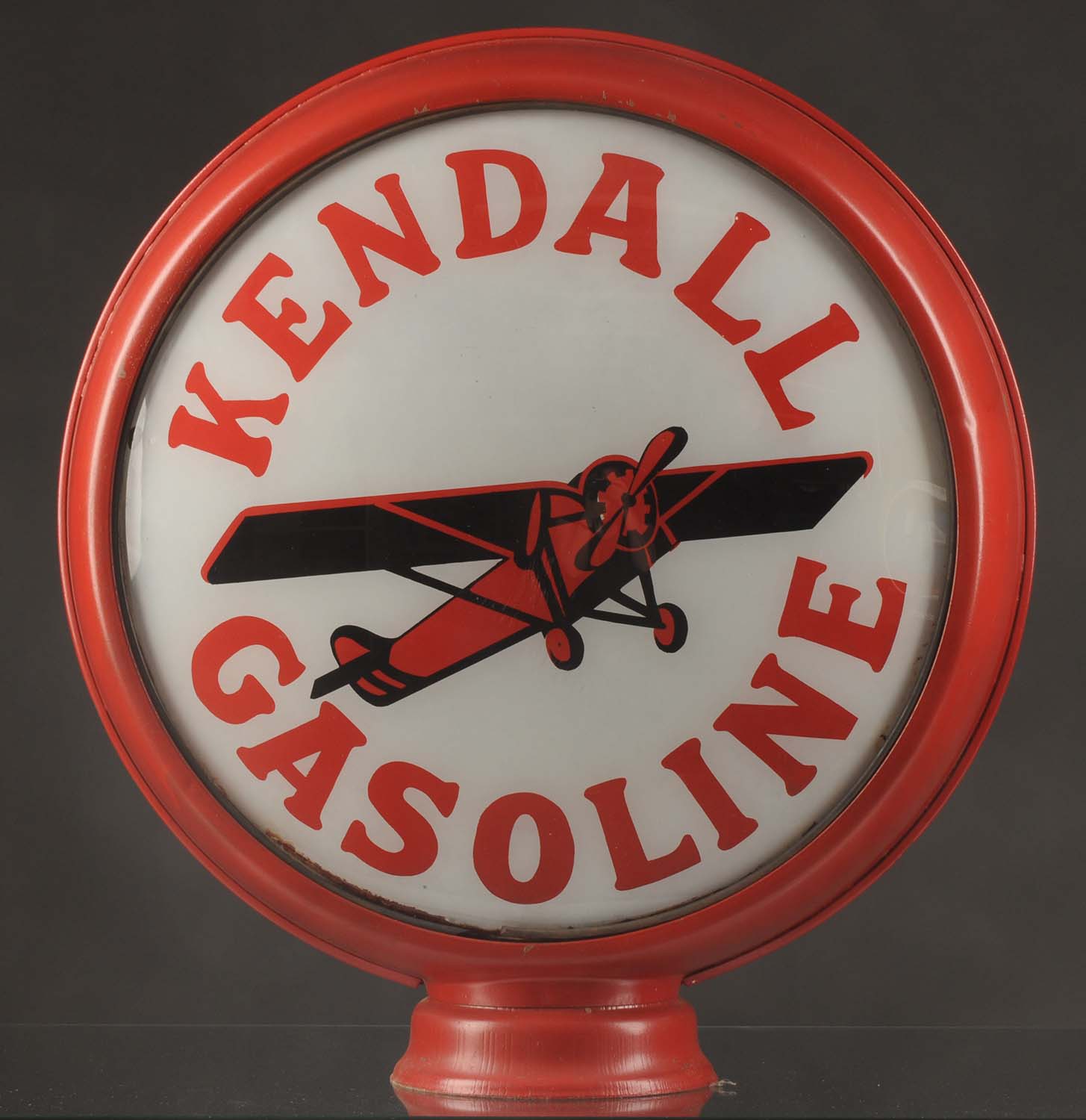 Lot #21, Kendall Gasoline Single Lens on a Metal Body, estimated at $12,000-$15,000.