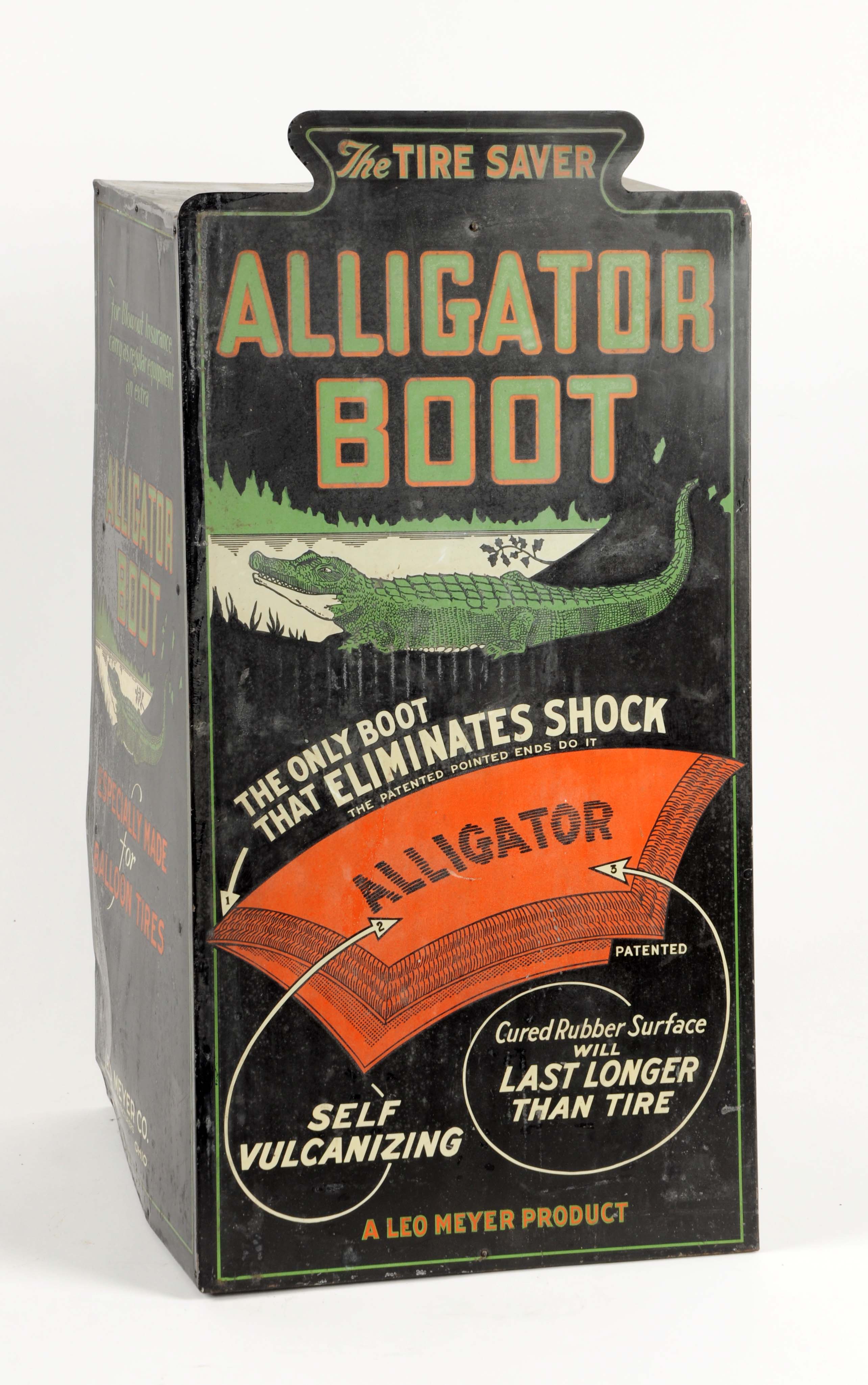 Lot #234	Alligator Boot Tire Repair Tin Store Display, estimated at $2,500-$4,000.