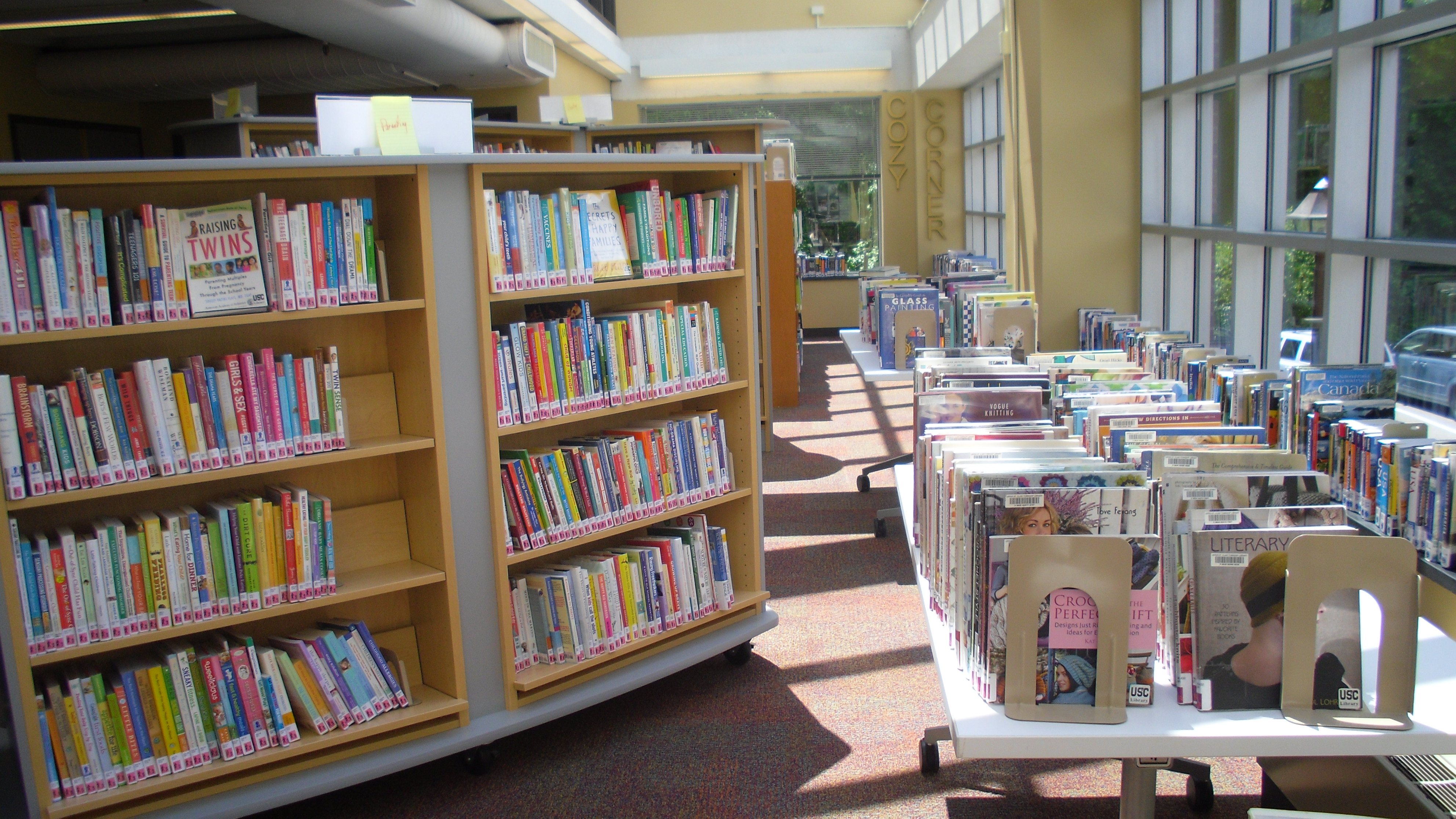 Staff at Upper St. Clair Township Re-shelving books onto new Performance Library Shelving