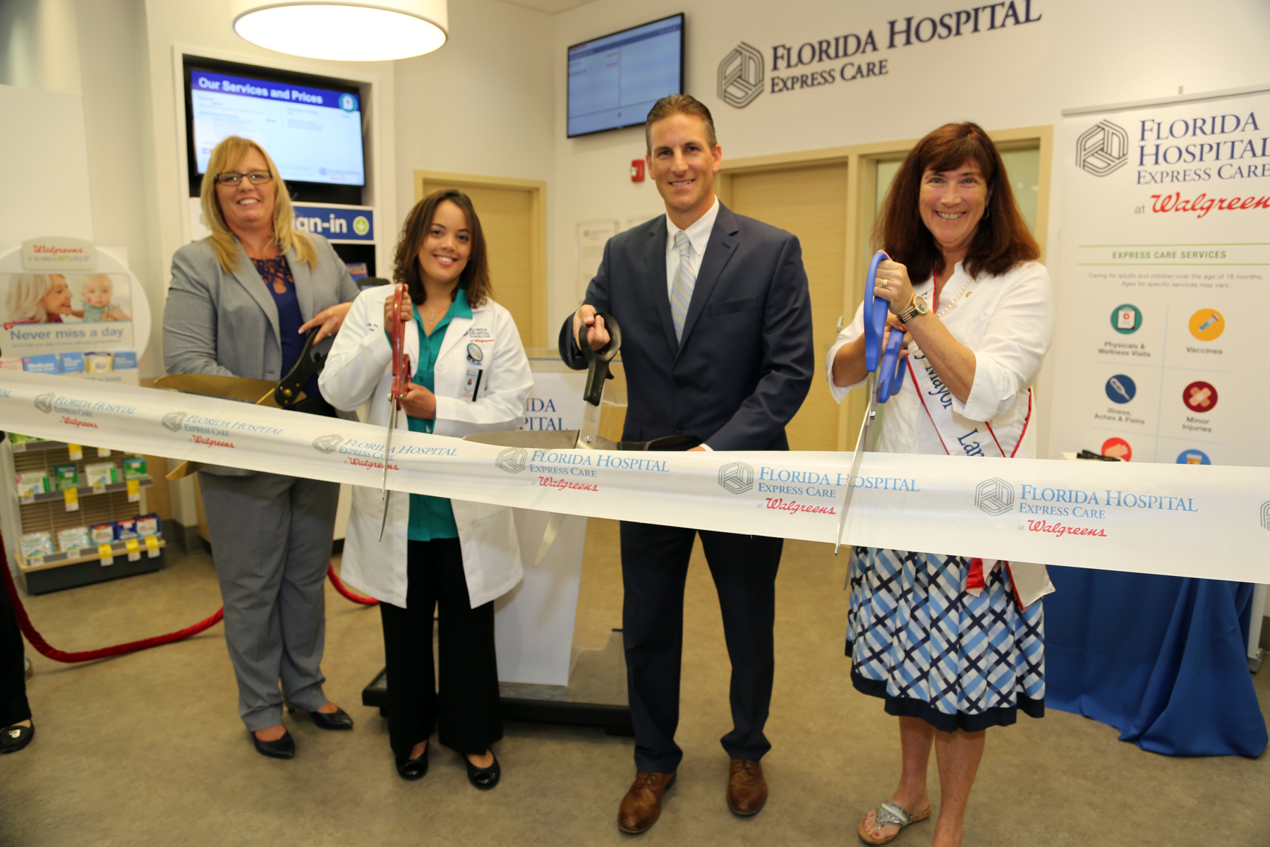 Land O’ Lakes Ribbon Cutting with Sue Ferbet, Kristin Parchmon, ARNP, Florida Hospital Express Care at Walgreens, Chris Jenkins and Sandy Graves, Honorary Mayor, Central Pasco Chamber of Commerce