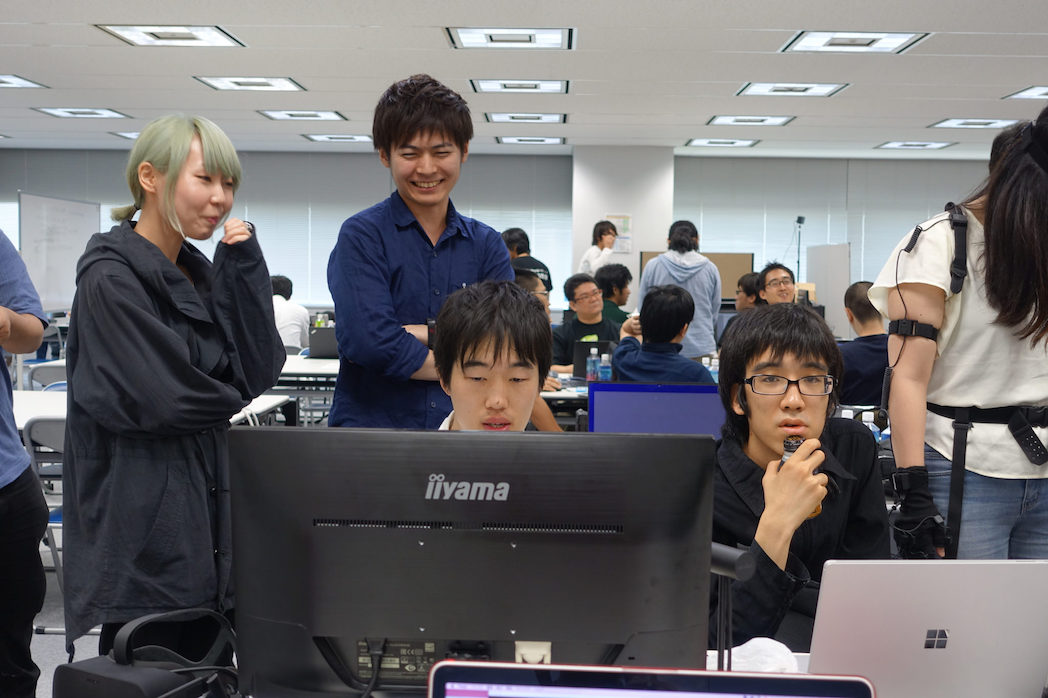 Participants work on their applications during the All Japan VR Hackathon 2016.