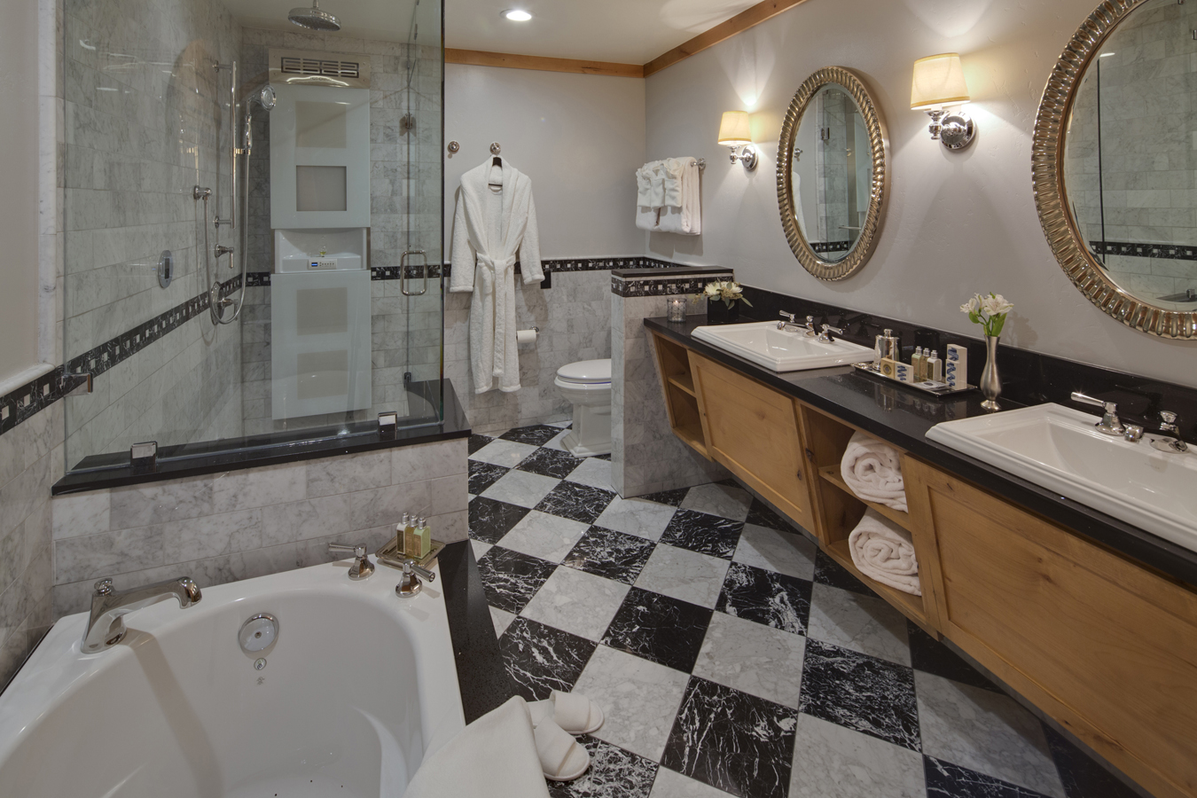The Landing’s luxurious marble baths are known for their spa-like feel, including snowy white robes and towels, double sinks, oversize sunflower shower heads and heated and lighted toilet seats.