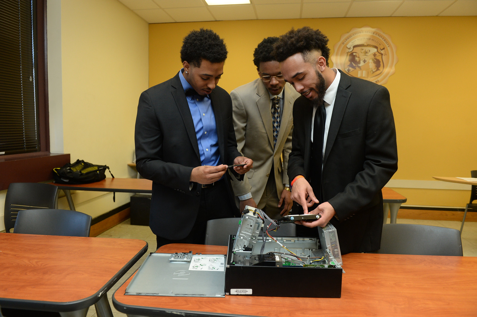 NPower St. Louis students assembling a computer