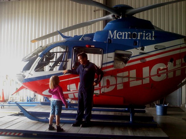Kenny and his daughter next to the EC-135.