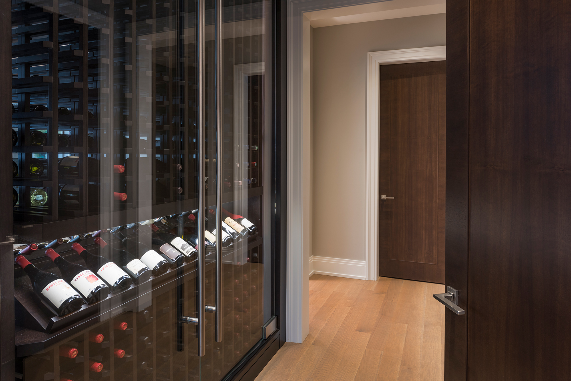 Double-Sided Custom Wine Cabinet Holds as Much Wine as Many Wine Cellars