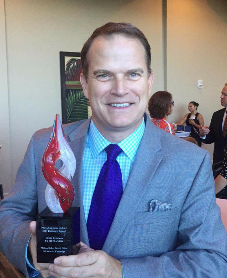 PRmediaNow Principal Colin Trethewey displays the 2017 PRSA Radiance Award for Media Relations Tactics.