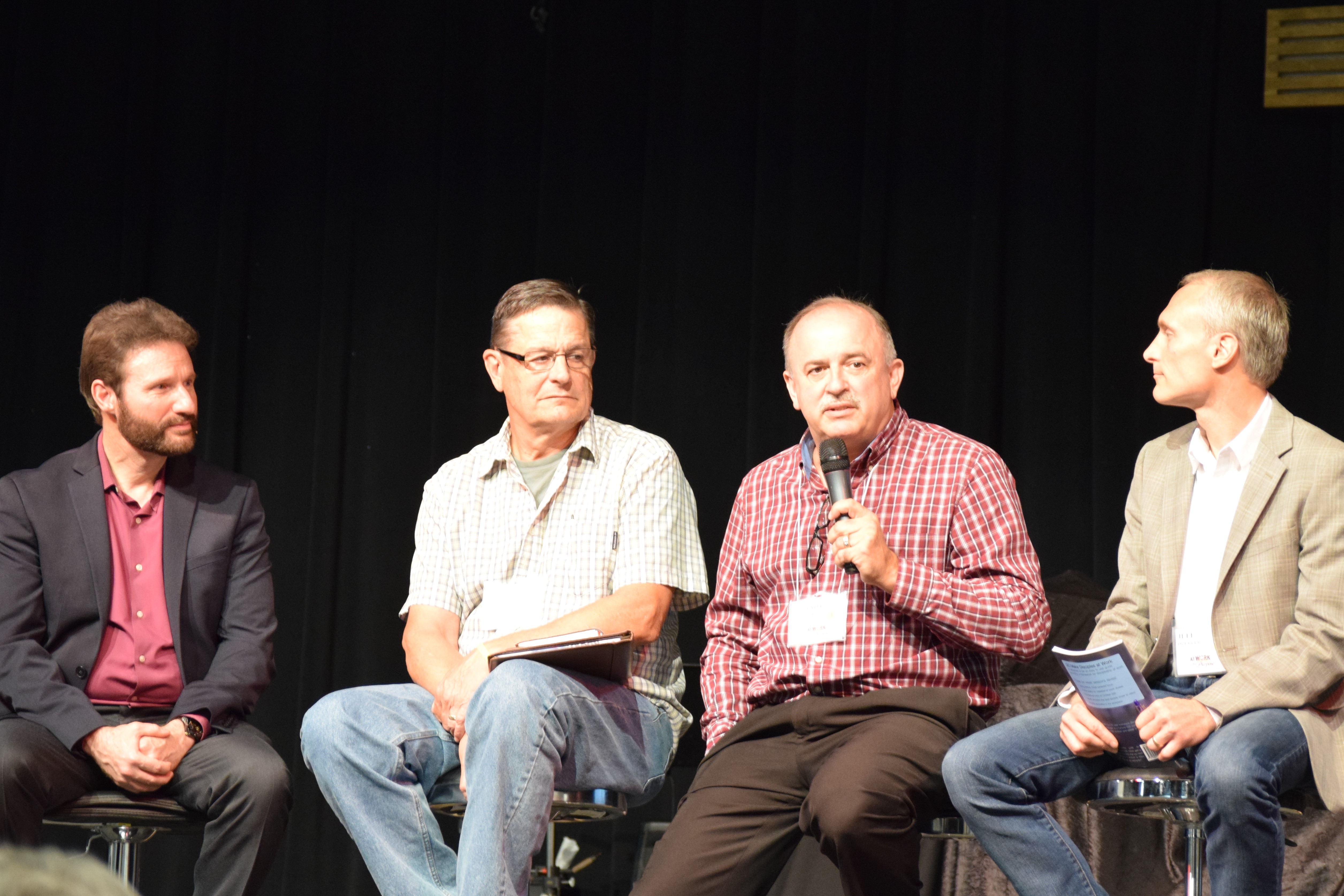 Proudfit and Cincinnati pastors hold a panel discussion at a recent AWOP event.