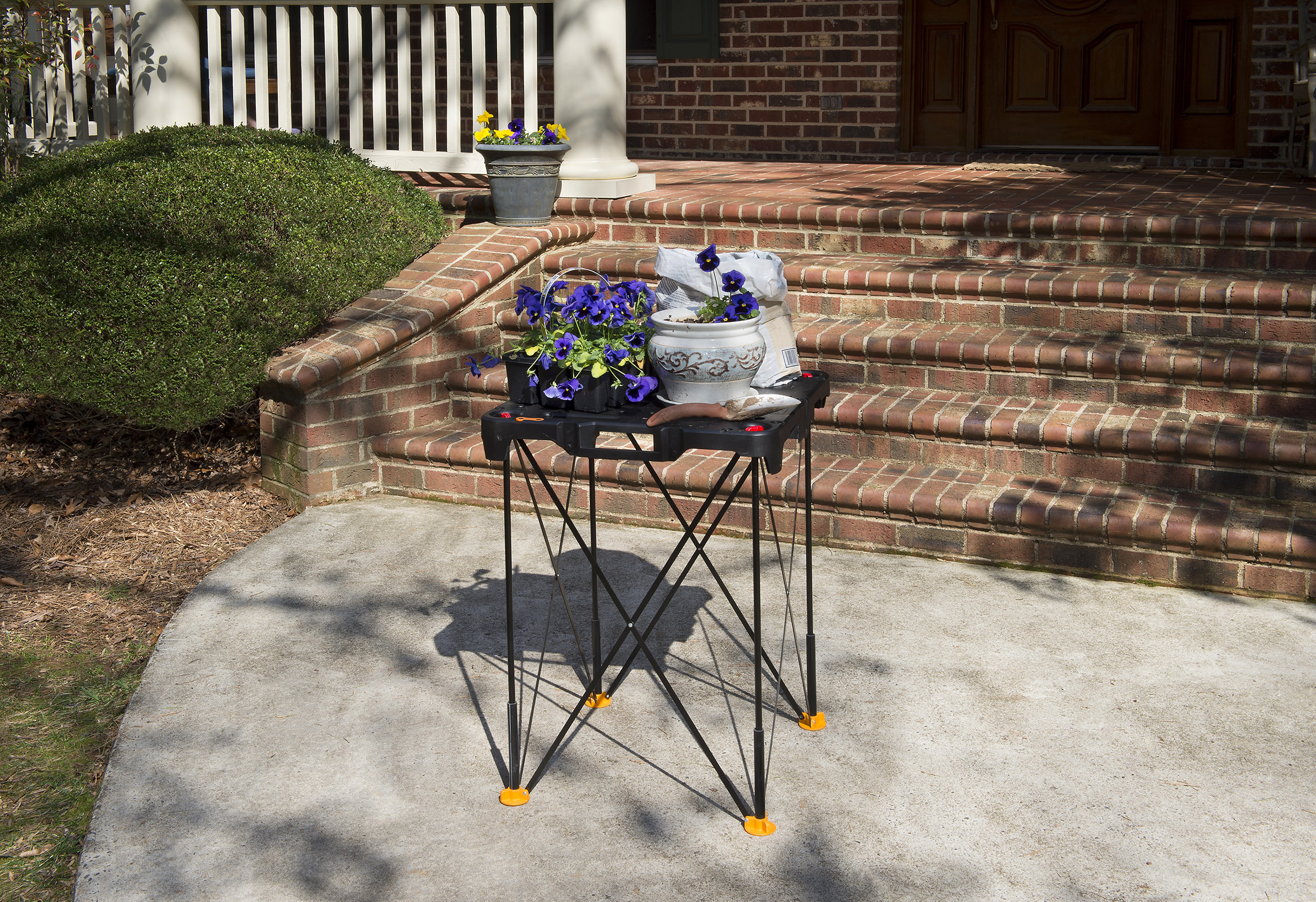 Sidekick makes handy potting table.