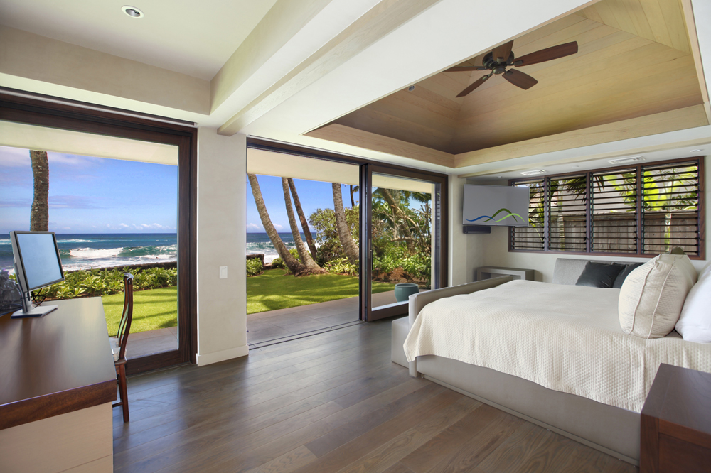 Four oceanfront bedrooms have their own private bath and lanai.