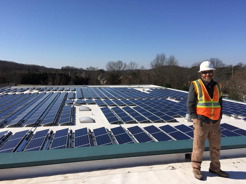 LightWave Solar installer stands with 300kW at a Knox County School in Knoxville, TN