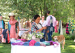 WRJ Design hosted a garden party trunk show in Jackson Hole, Wyoming, to benefit social businesses Ock Pop Tok and Passa Paa with a mission of helping Laos village economies and women weavers.