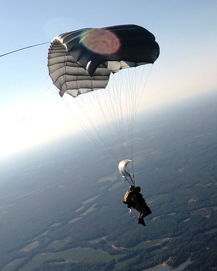 Tandem Master Alex Coker practices for a high-altitude eclipse skydive.