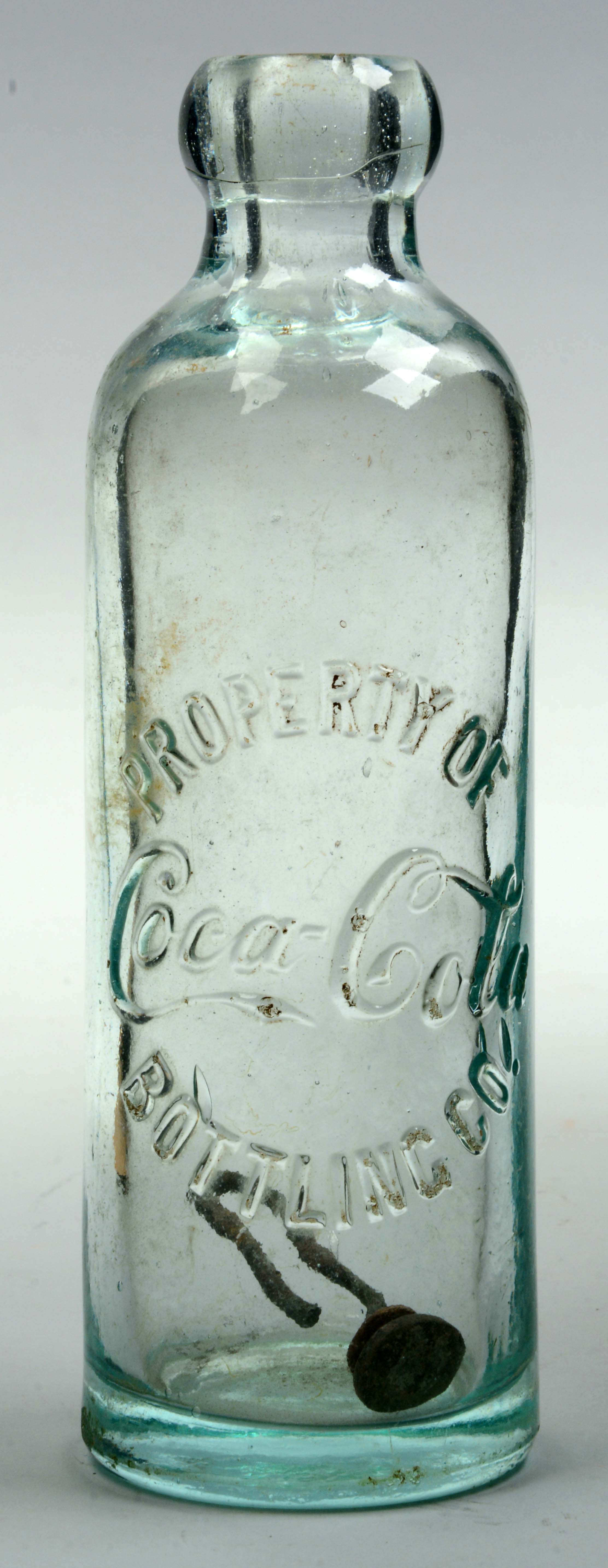 Early Coca-Cola Hutchinson Bottle, estimated at $4,000-6,000.