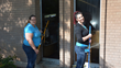 Two collaborators bring some light to the rooms at OWCAP-Head Start by cleaning the windows.