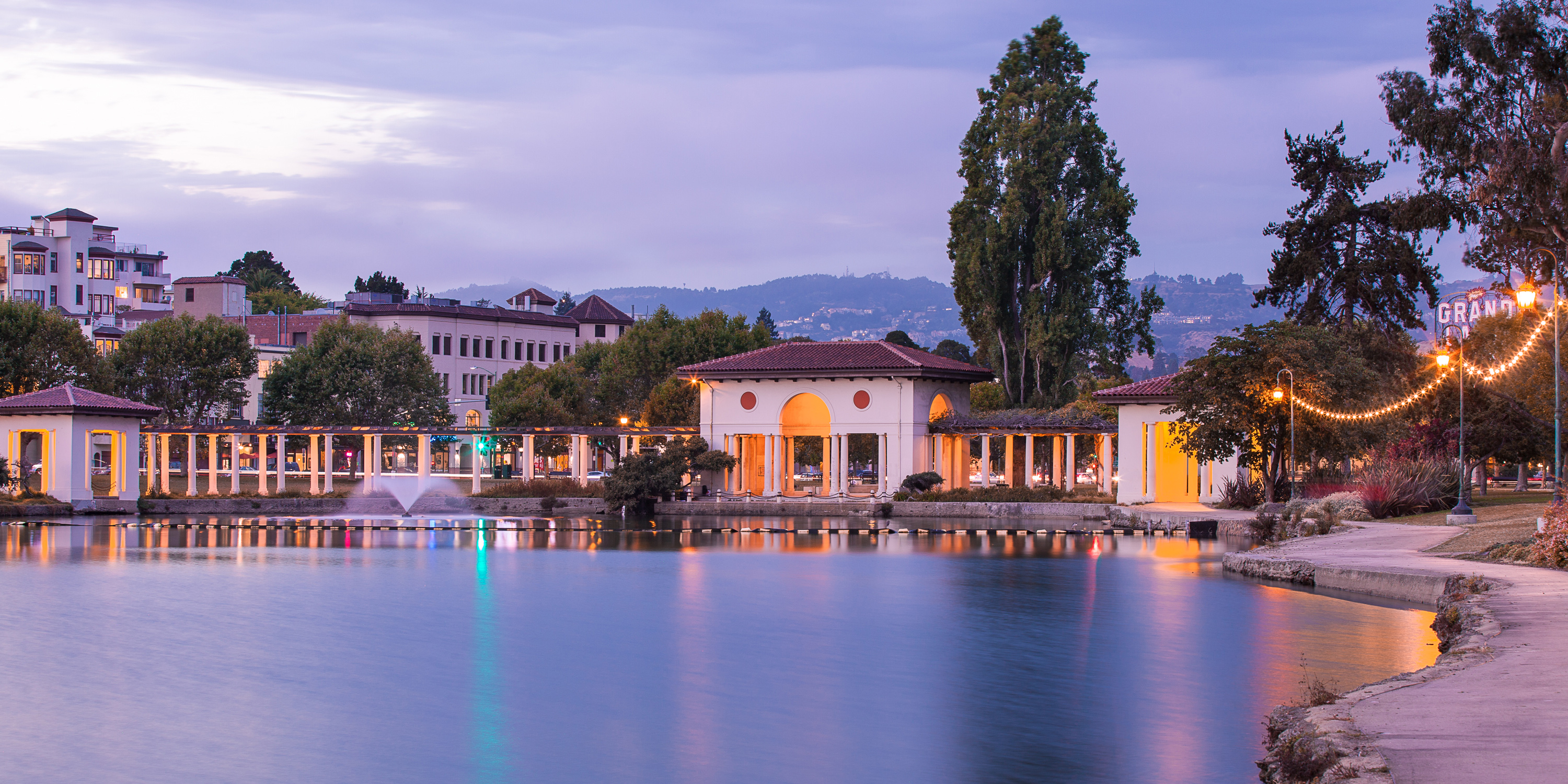 Lake Merritt is surrounded by an accesible walking path and pergola for visitors.