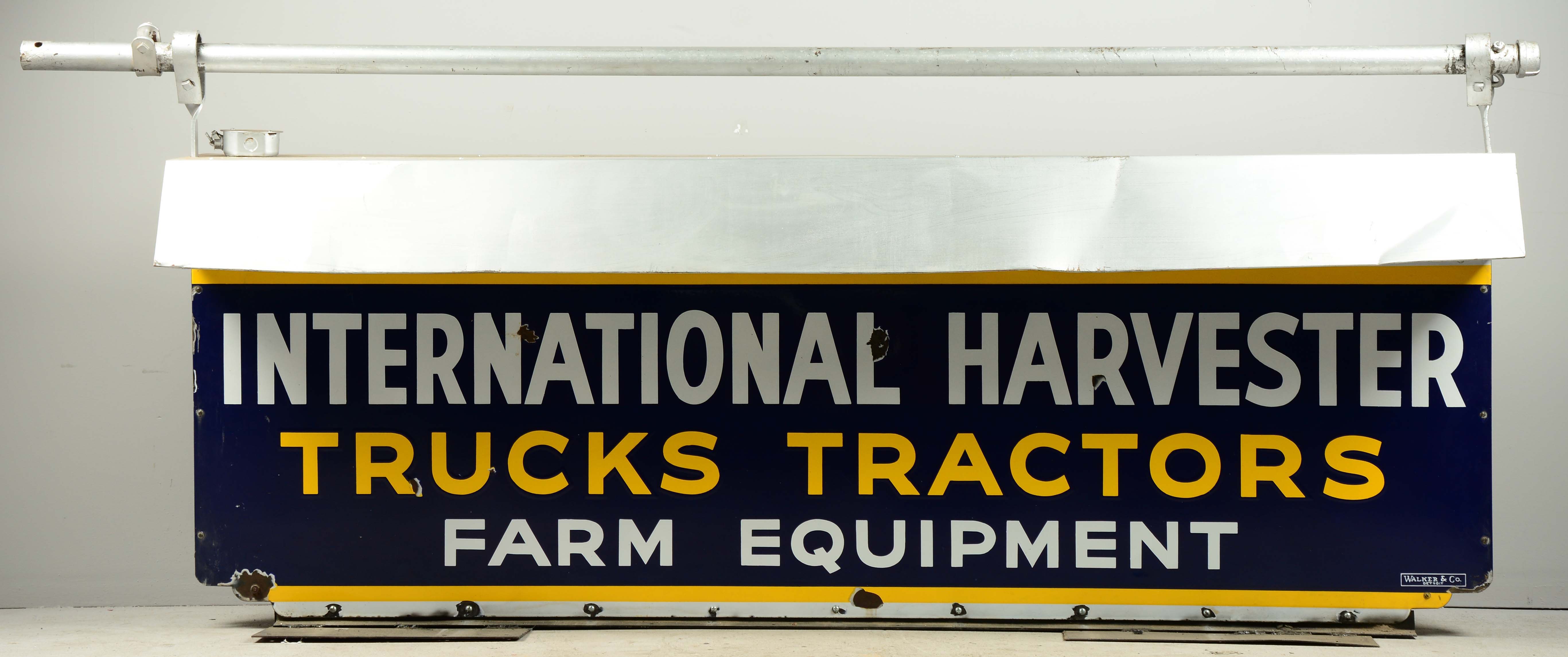 International Harvester Farm Equipment Sign, estimated at $6,000-9,000.