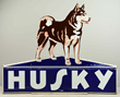 Husky Dogs Mounted Diecut Porcelain Sign, estimated at $10,000-20,000.