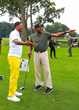 Jalen Rose and Ron Harper on the first tee at Detroit Golf Club for The Jalen Rose Golf Classic
