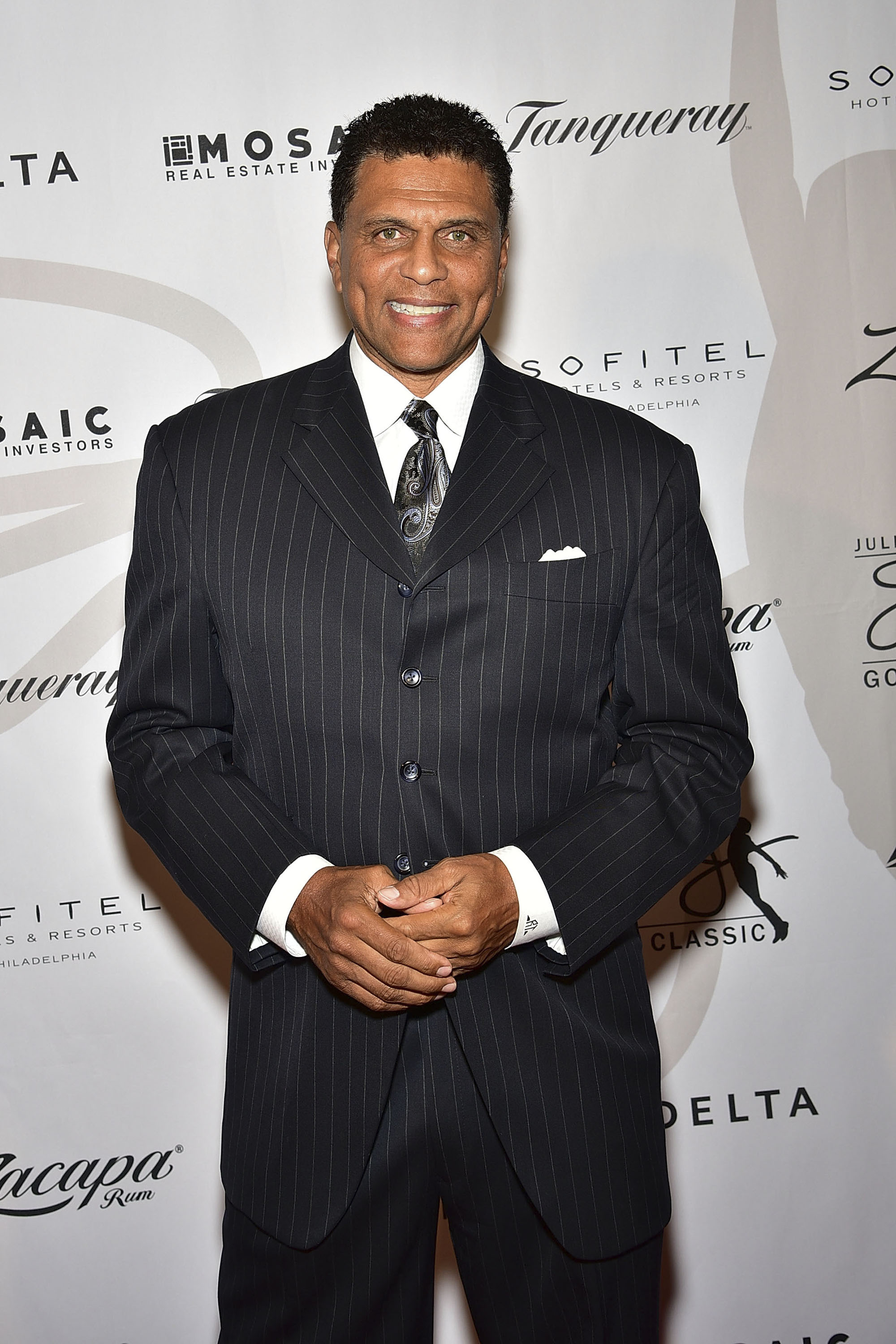Reggie Theus walks the red carpet at The 2016 Erving Black Tie Ball and Pairings Party in Philadelphia