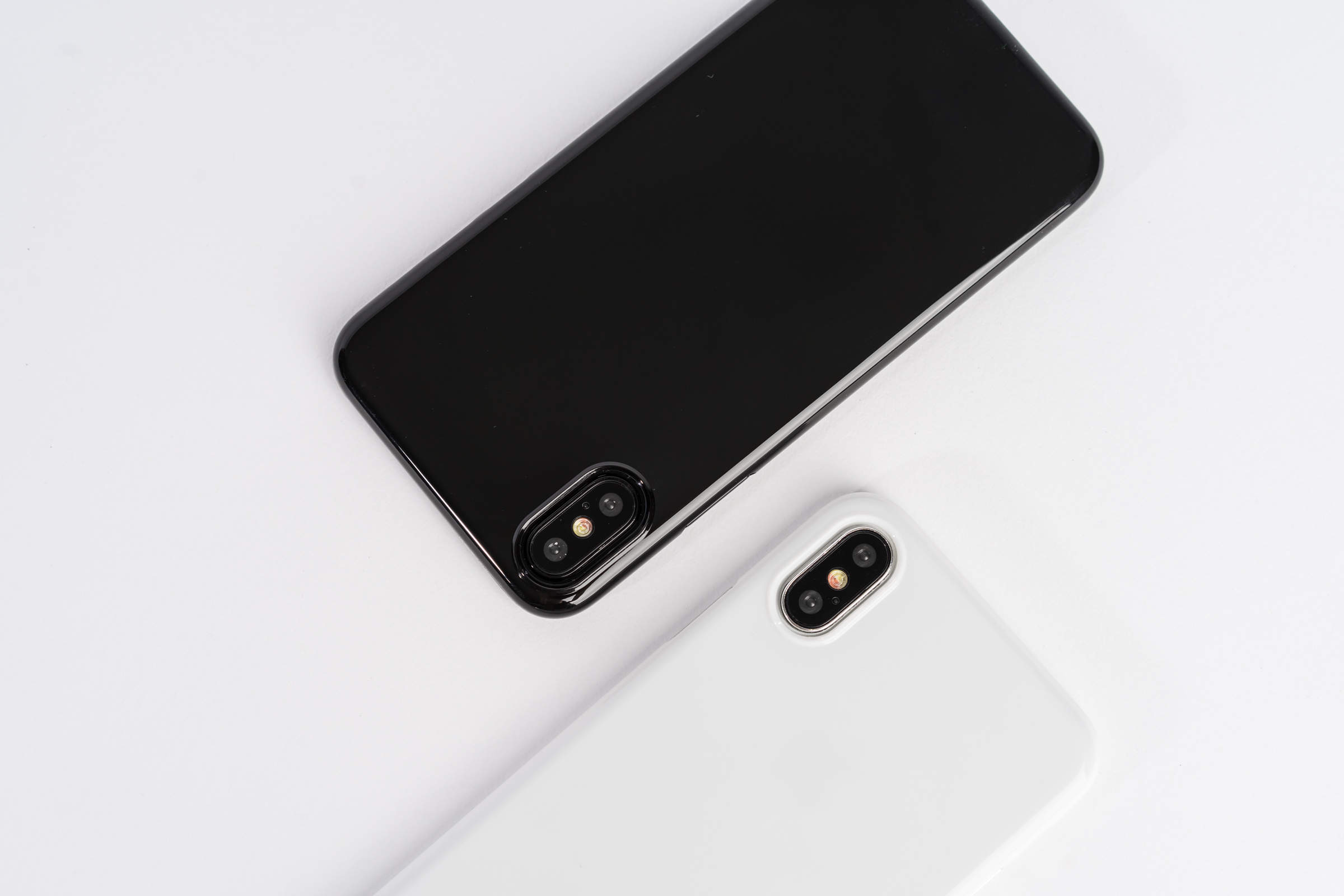 Jet Black and Jet White Peel Cases for iPhone X
