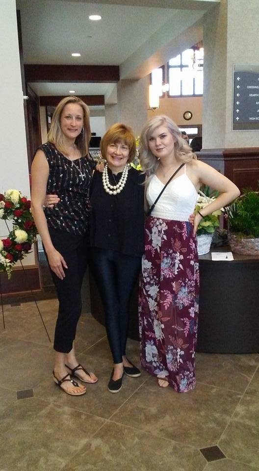 Jill with two of her three girls at Kenneth's memorial service.