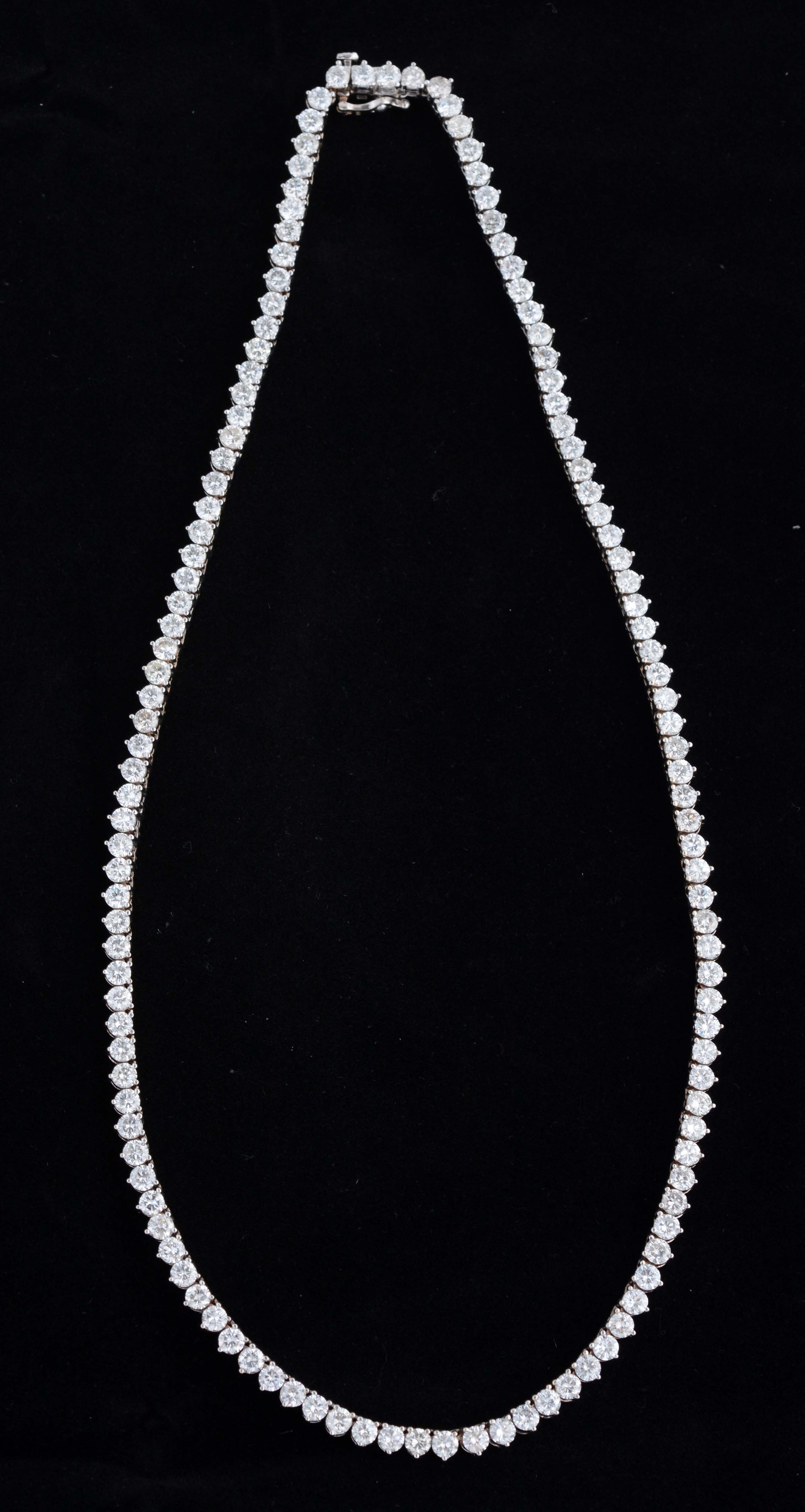 14K White Gold and Diamond Necklace, estimated at $12,000-20,000.