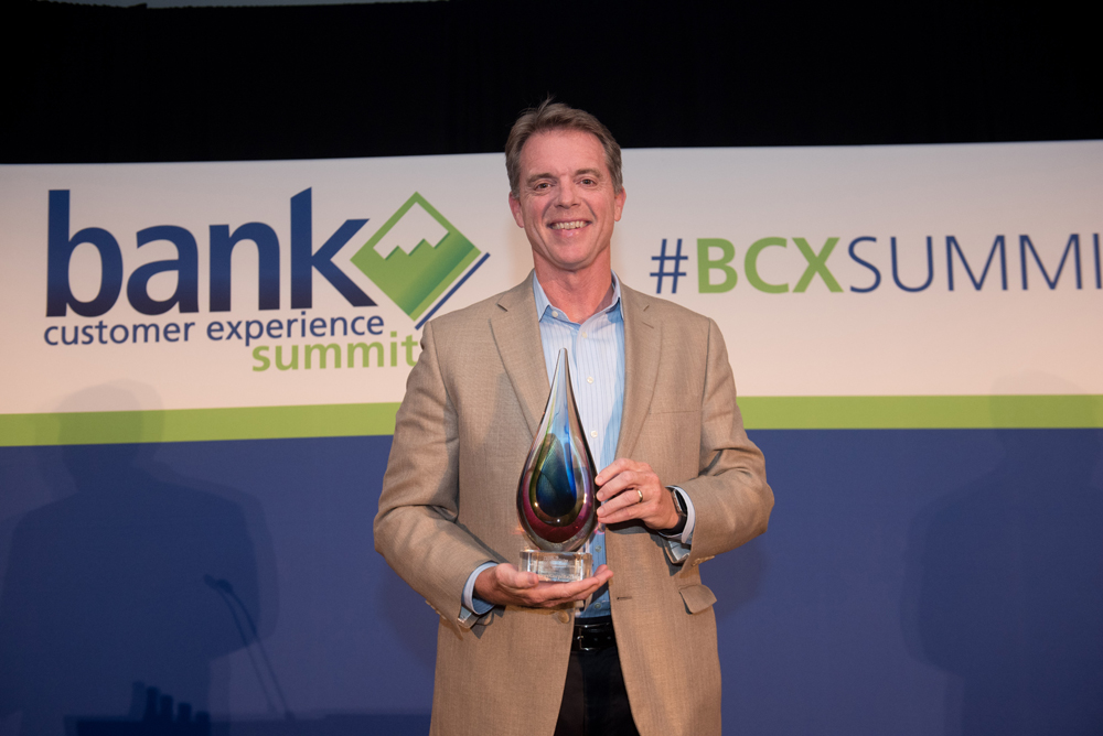 Mike Branton, Managing Partner at StrategyCorps, accepted the award for Best Mobile Experience (US fintech) for StrategyCorps’ BaZing.