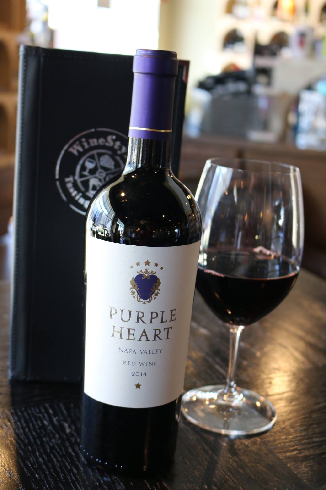 $1.00 donated for every glass poured of Purple Heart wine