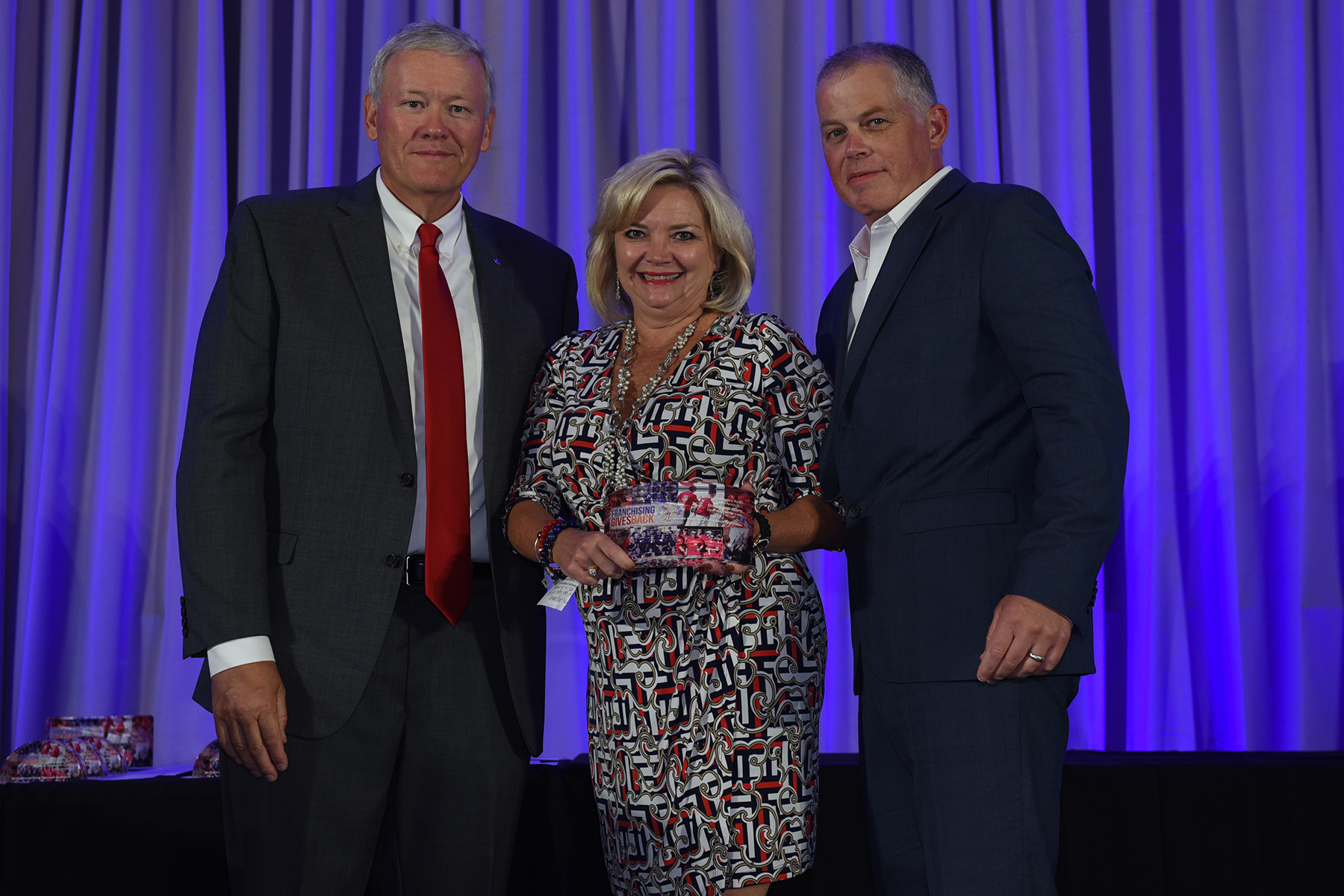 Janet Harris, CFE, presented with the Franchising Gives Back Award.