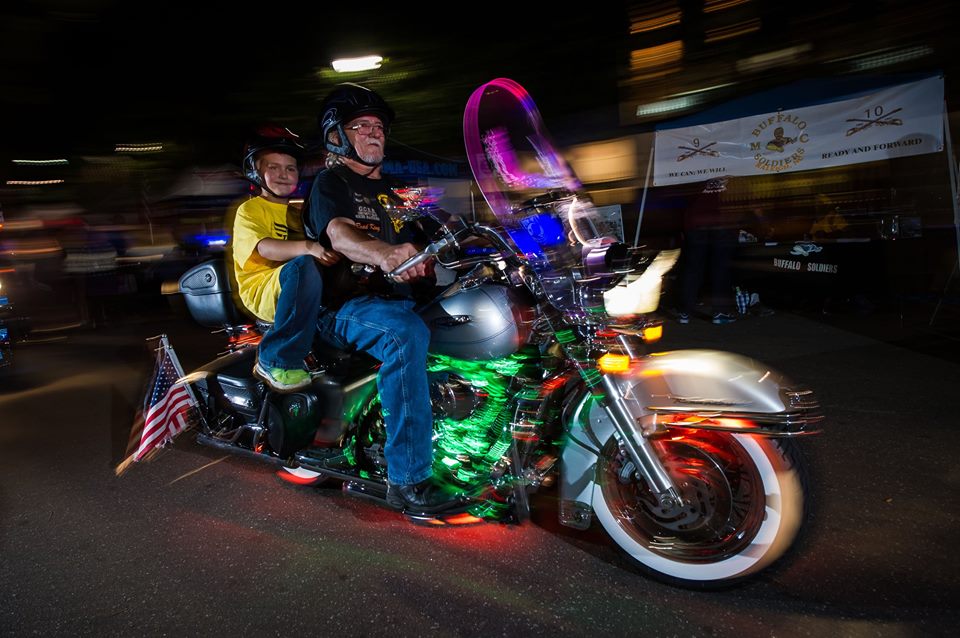 Motorcyclists participate in the Parade of Lights in Raleigh, N.C., a charity event at Ray Price Capital City Bikefest.