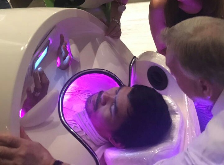 Manny Pacquiao selecting wellness features within the Cocoon Wellness Pro Pod