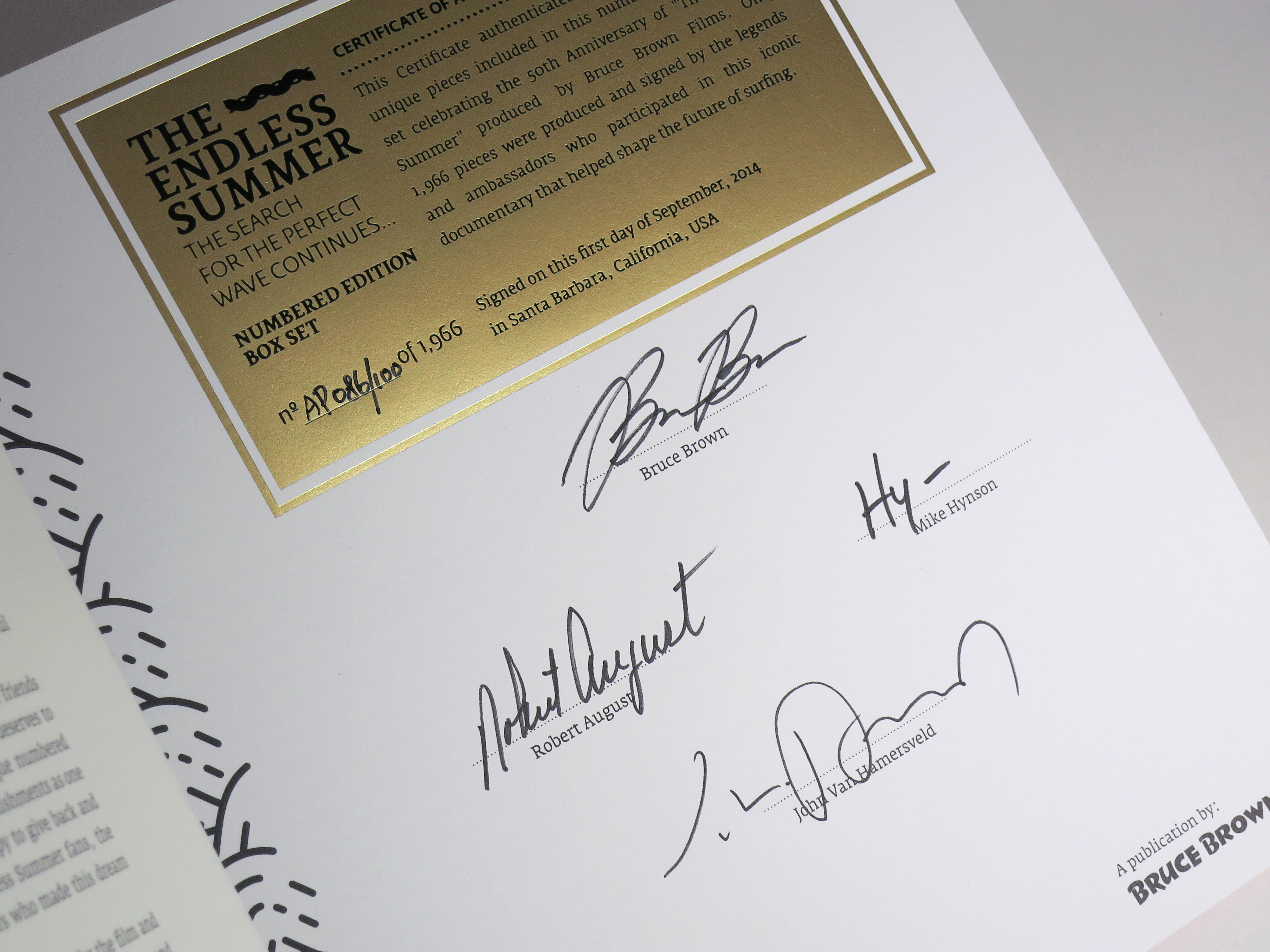 Hand-Signed Certificate of Authenticity signed by Bruce Brown, Legendary Surfers Robert August and Mike Hynson and Poster Designer, John Van Hamersveld.