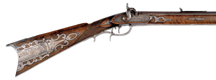 Historic Silver Mounted Hawkens Rifle of George W. Atchison, estimated at $80,000-100,000.