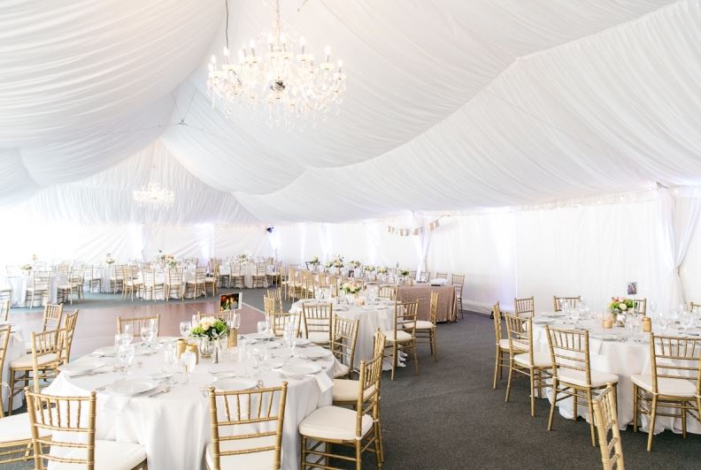 A seasonal white tented pavilion is one of The Landing Resort & Spa’s beautiful options for weddings, receptions and events at the Lake Tahoe boutique hotel with skilled staff and luxurious amenities.