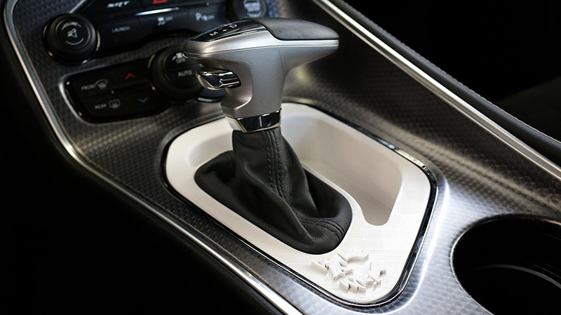 The "World's Most 3D-Printed Hellcat" includes a custom 3D-printed center console with a deepened well and branding emblem.