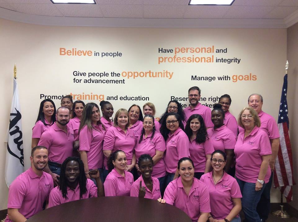 Anago Cleaning Systems' corporate staff members participating in the company's Breast Cancer Awareness campaign.