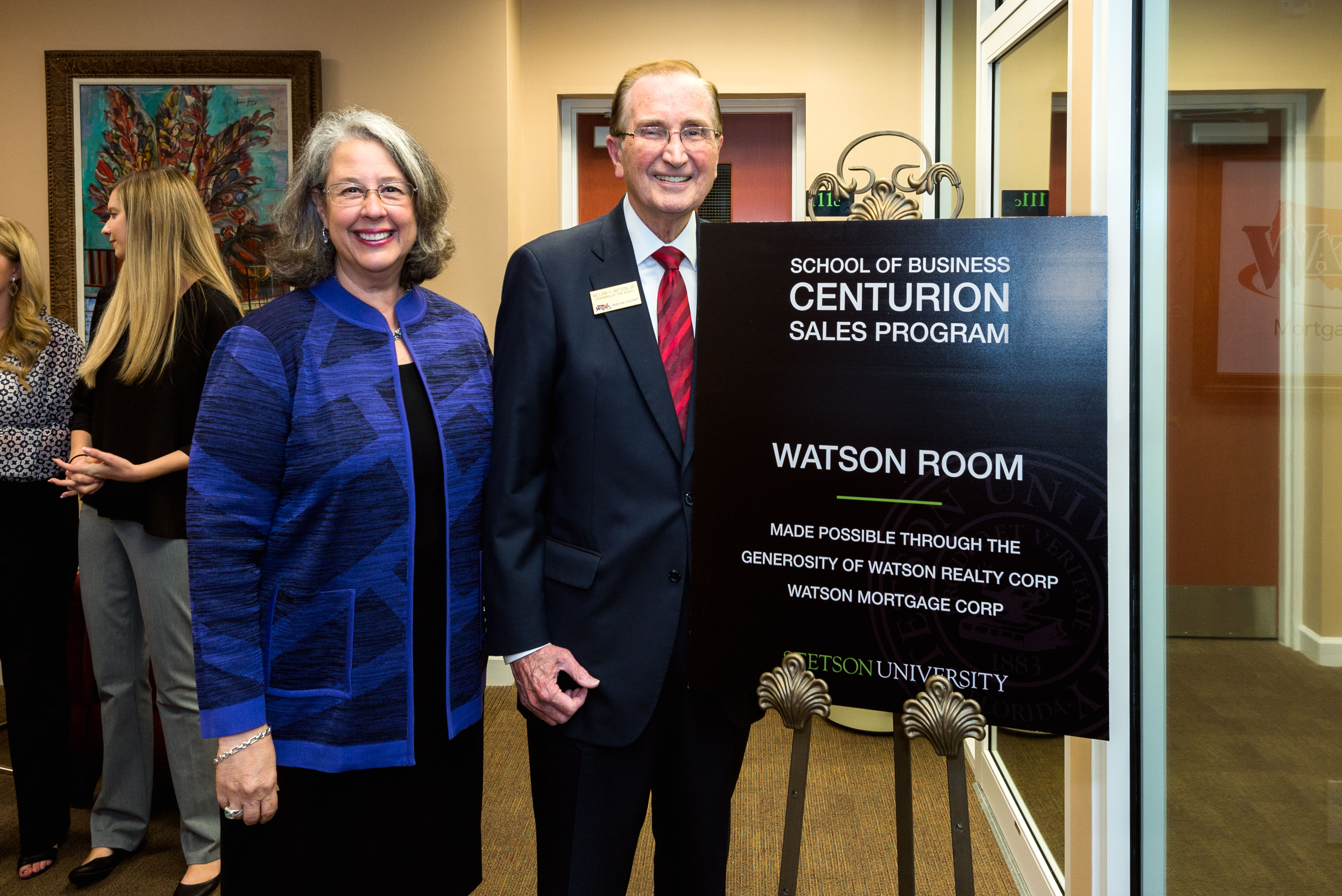 Stetson University President Wendy B. Libby, PhD, and William "Bill" A. Watson Jr., Founder and Chairman of the Board, Watson Realty, unveiled the Watson Sales Lab.