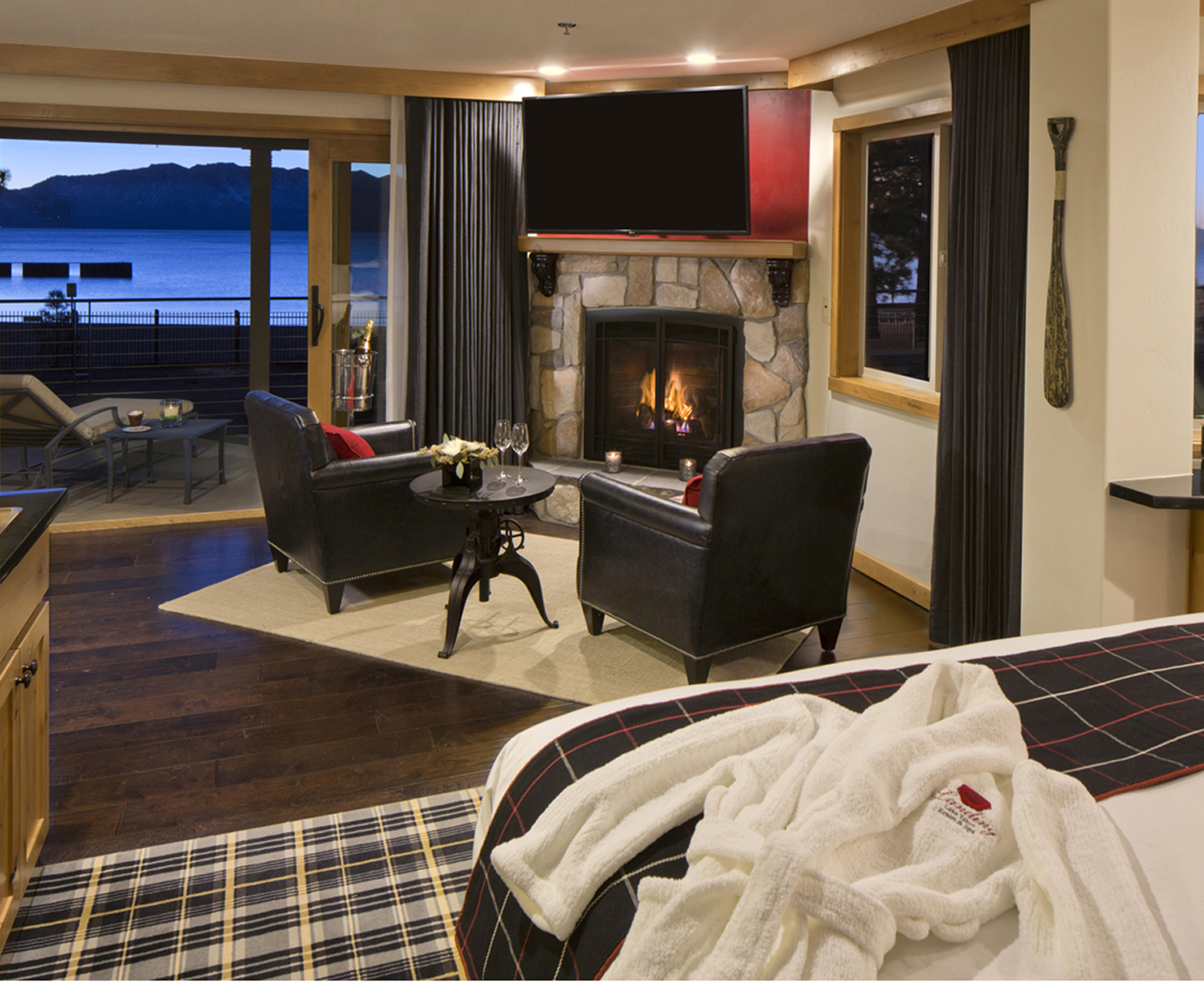 Luxuriously appointed, individually decorated rooms at The Landing include fireplaces, private balconies and luxurious marble bathrooms for the perfect cozy retreat, most with lake views.