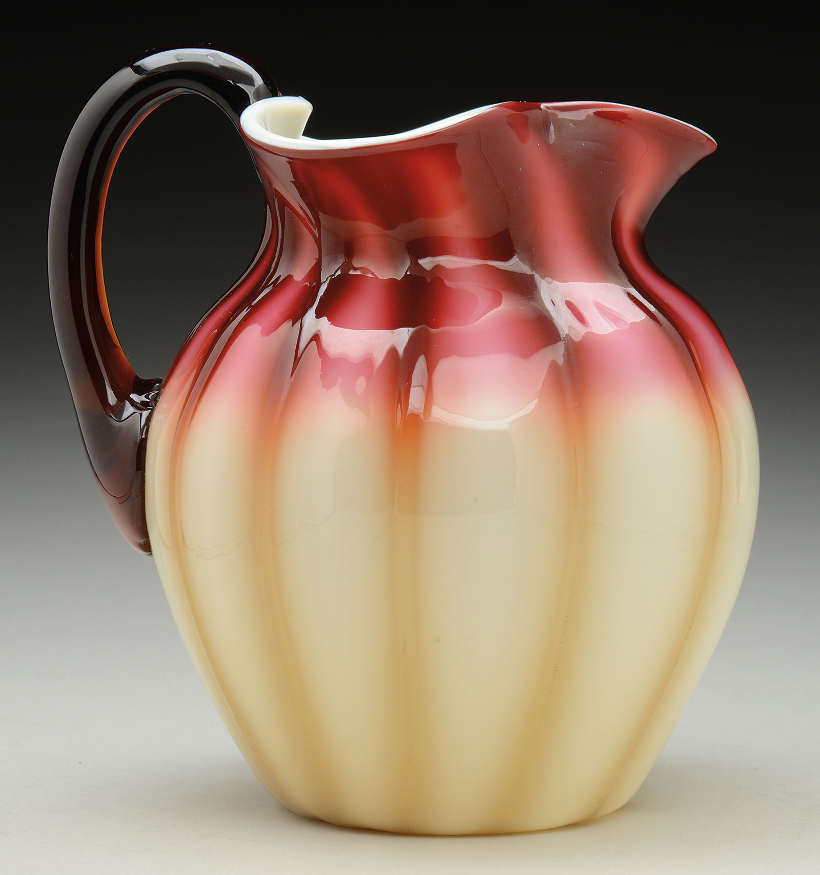 Plated Amberina Pitcher, estimated at $3,500-4,000.