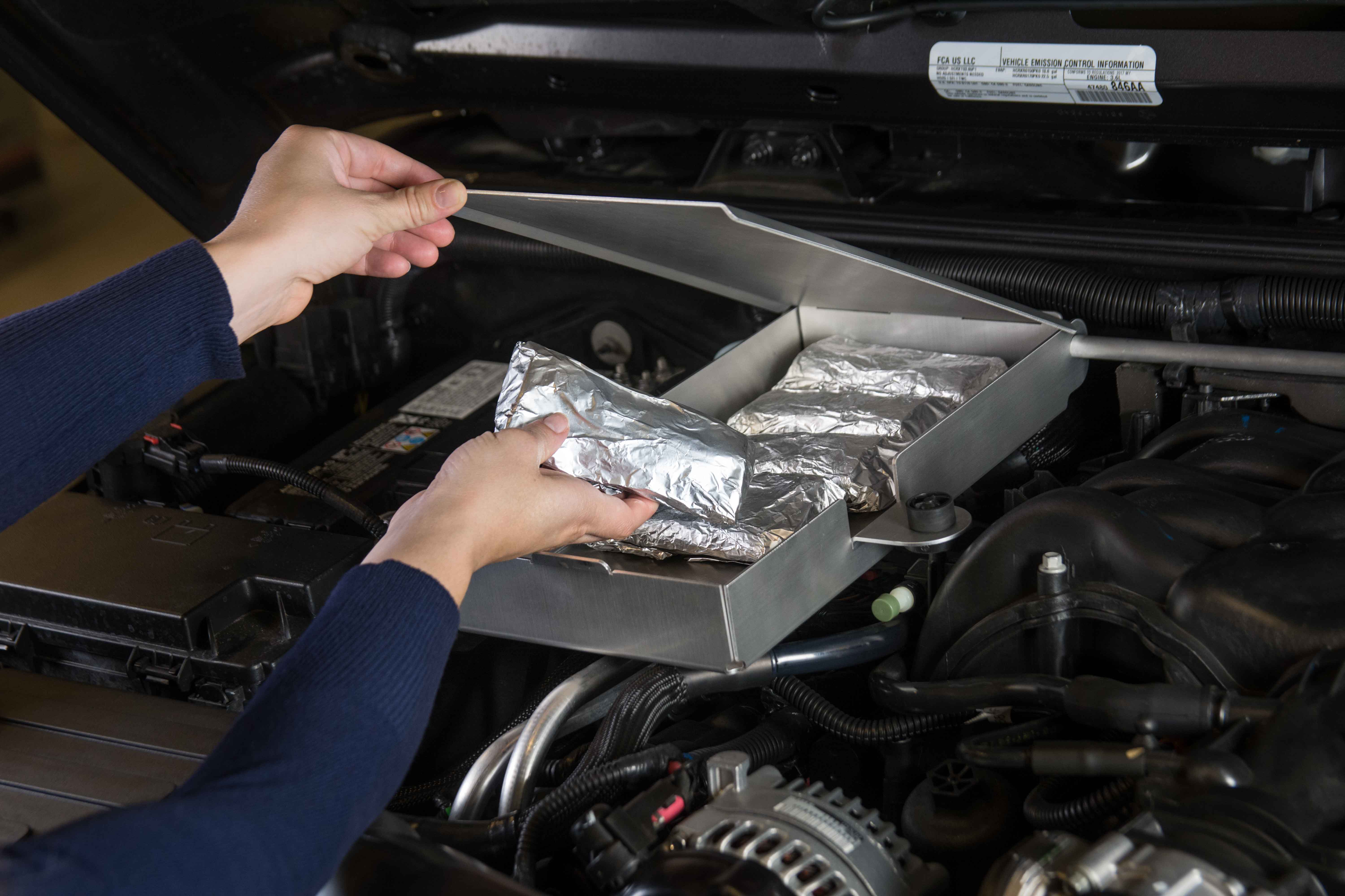 Repurposing the thermal dynamics of the Jeep’s manifold, the all aluminum Trail Oven Warmer efficiently reheats previously prepared and precooked foods like burritos, tortillas and sandwiches.