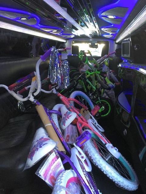 Chapel of the Flowers Limousine Filled with Bikes for KLUC Toy Drive