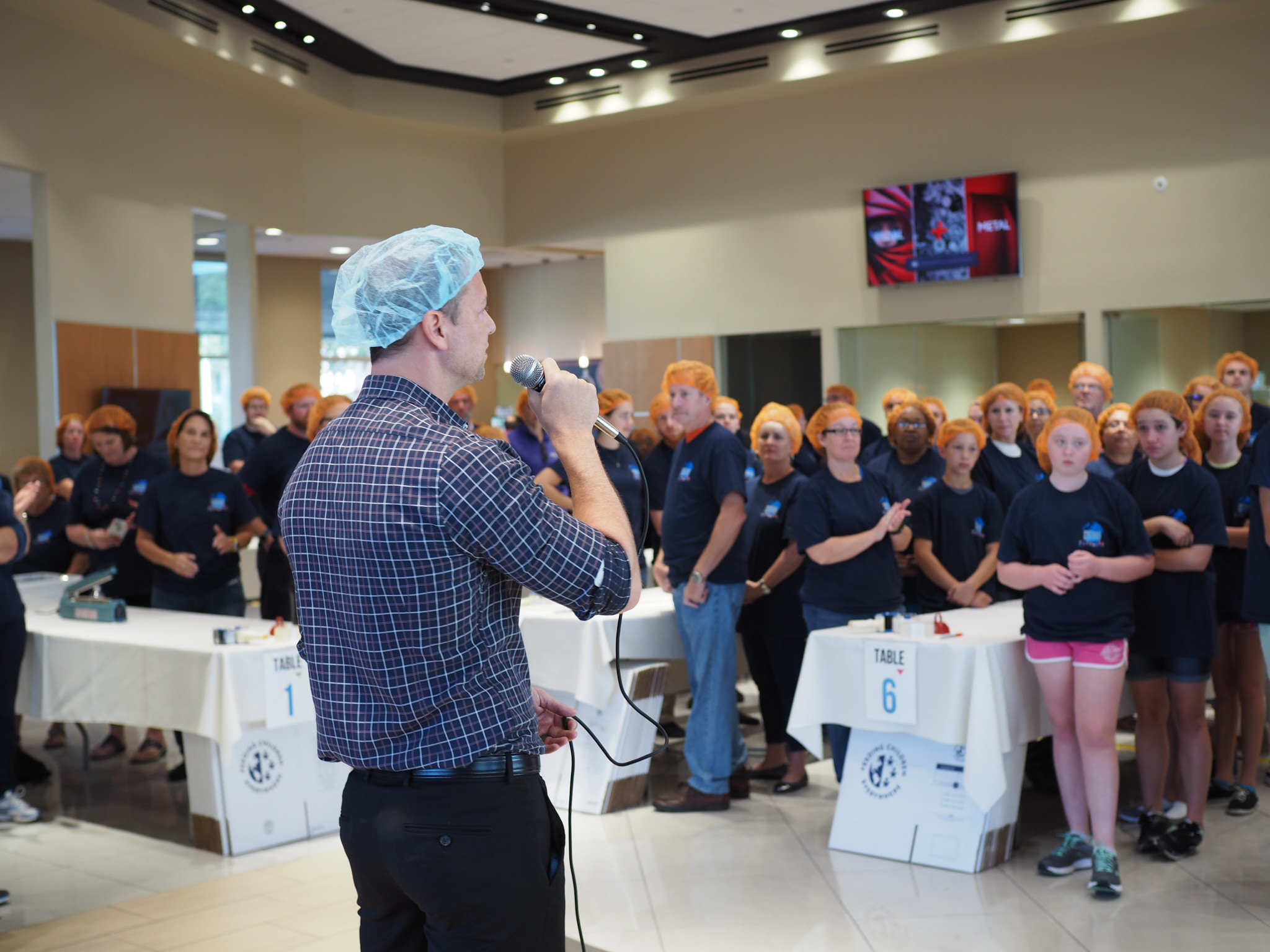 Crown Automotive Group Packaged Over 100,000 Meals For Feeding Children Everywhere