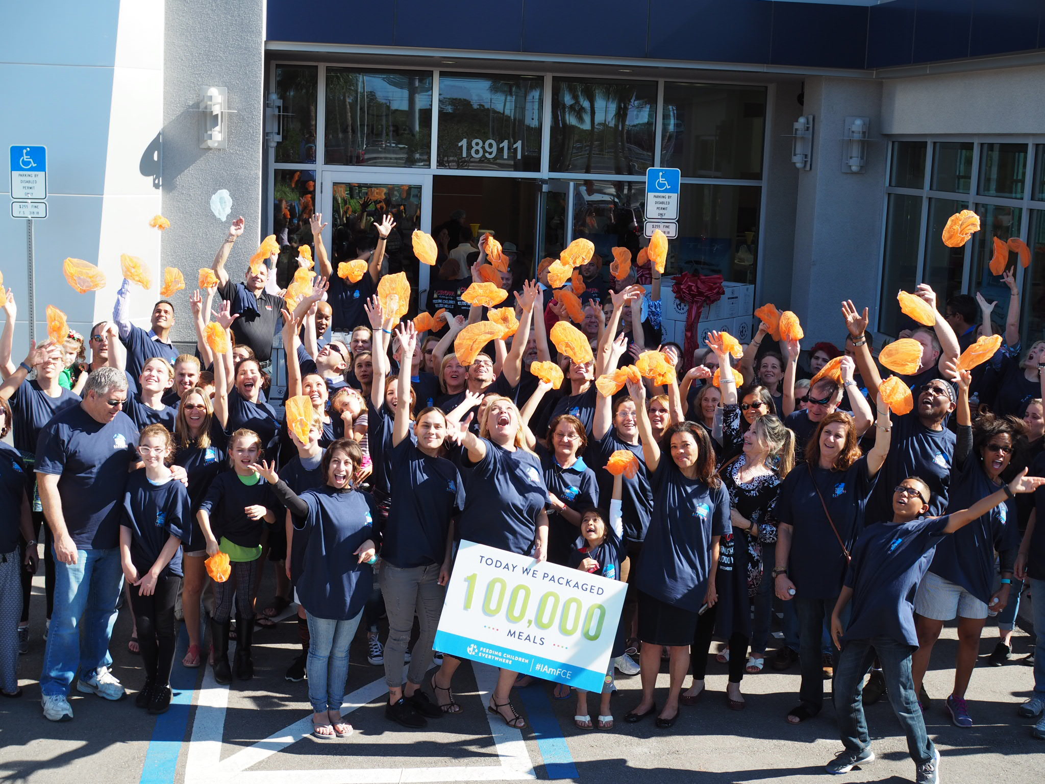 Crown Automotive Group Packaged Over 100,000 Meals For Feeding Children Everywhere