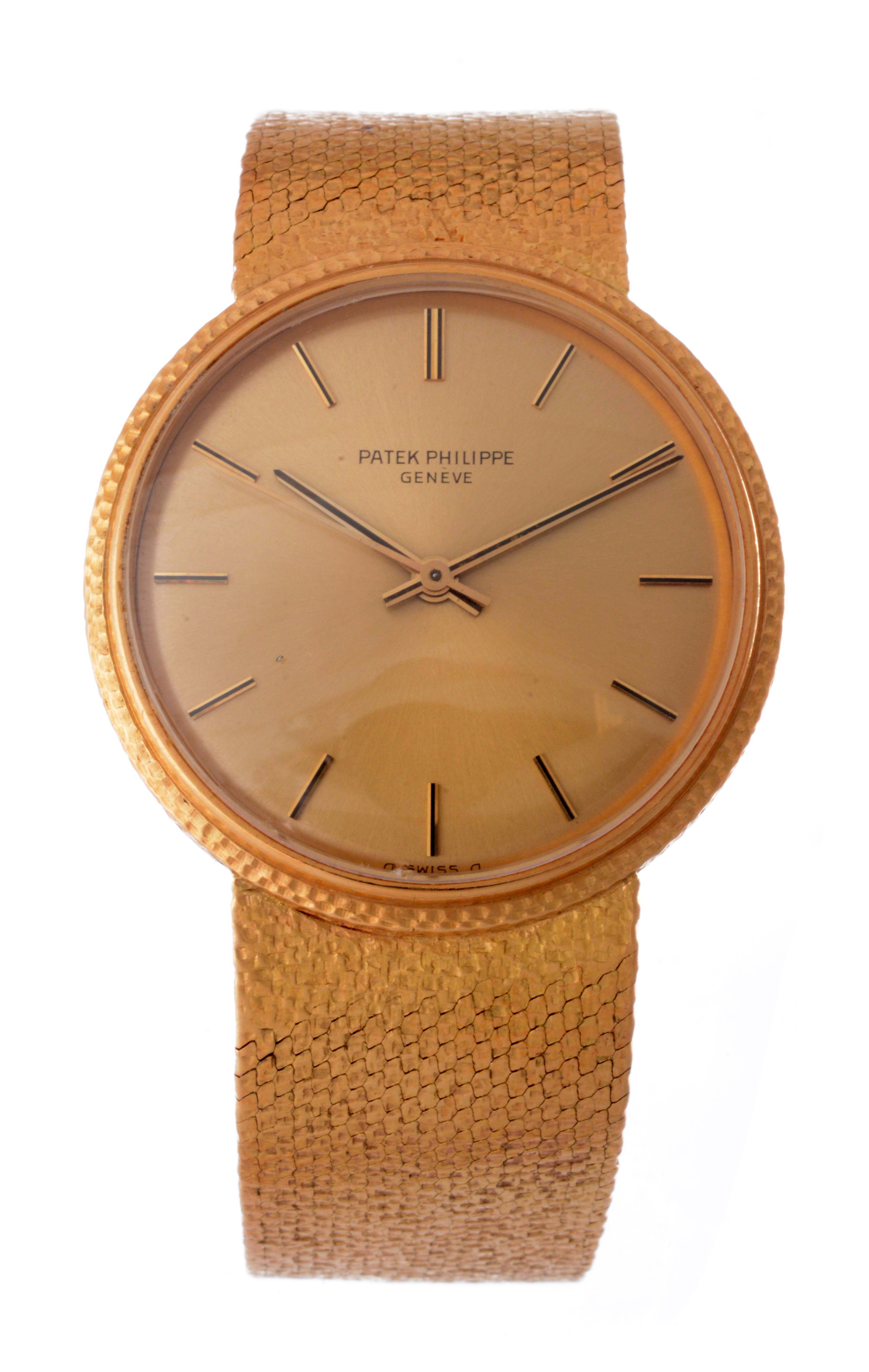 Patek Philippe 18k Wristwatch Model # 3563 2, estimated at $8,000-12,000.