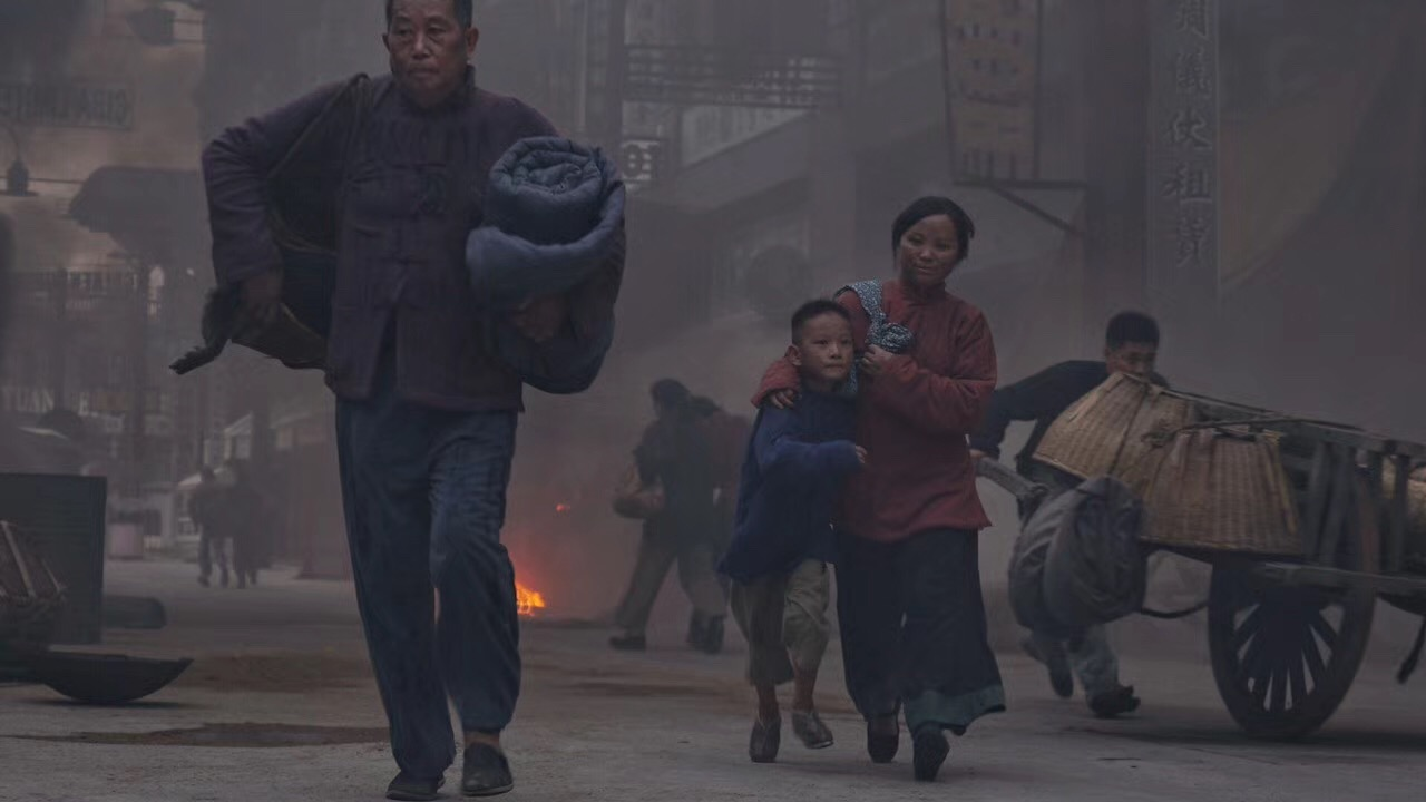 Chinese civilians flee to the safety zone in the fallen city in SCARS OF NANKING.
