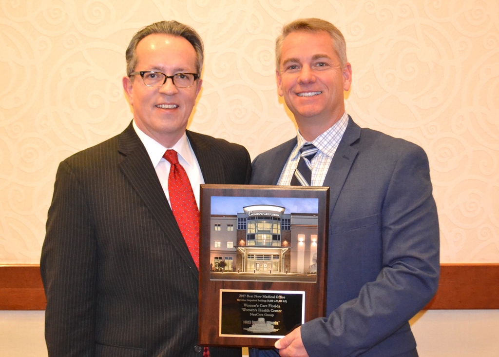 Todd Varney, NexCore’s Managing Principal (right), accepts the HREI Insights Award from HREI Publisher Murray W. Wolf a Dec. 7 luncheon attended by 300 industry peers in Scottsdale, Ariz.