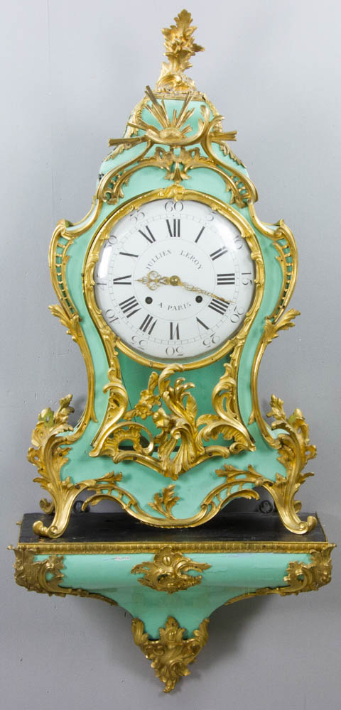 19thC. French Louis XV-style clock with shelf having ornate bronze ormolu mounts